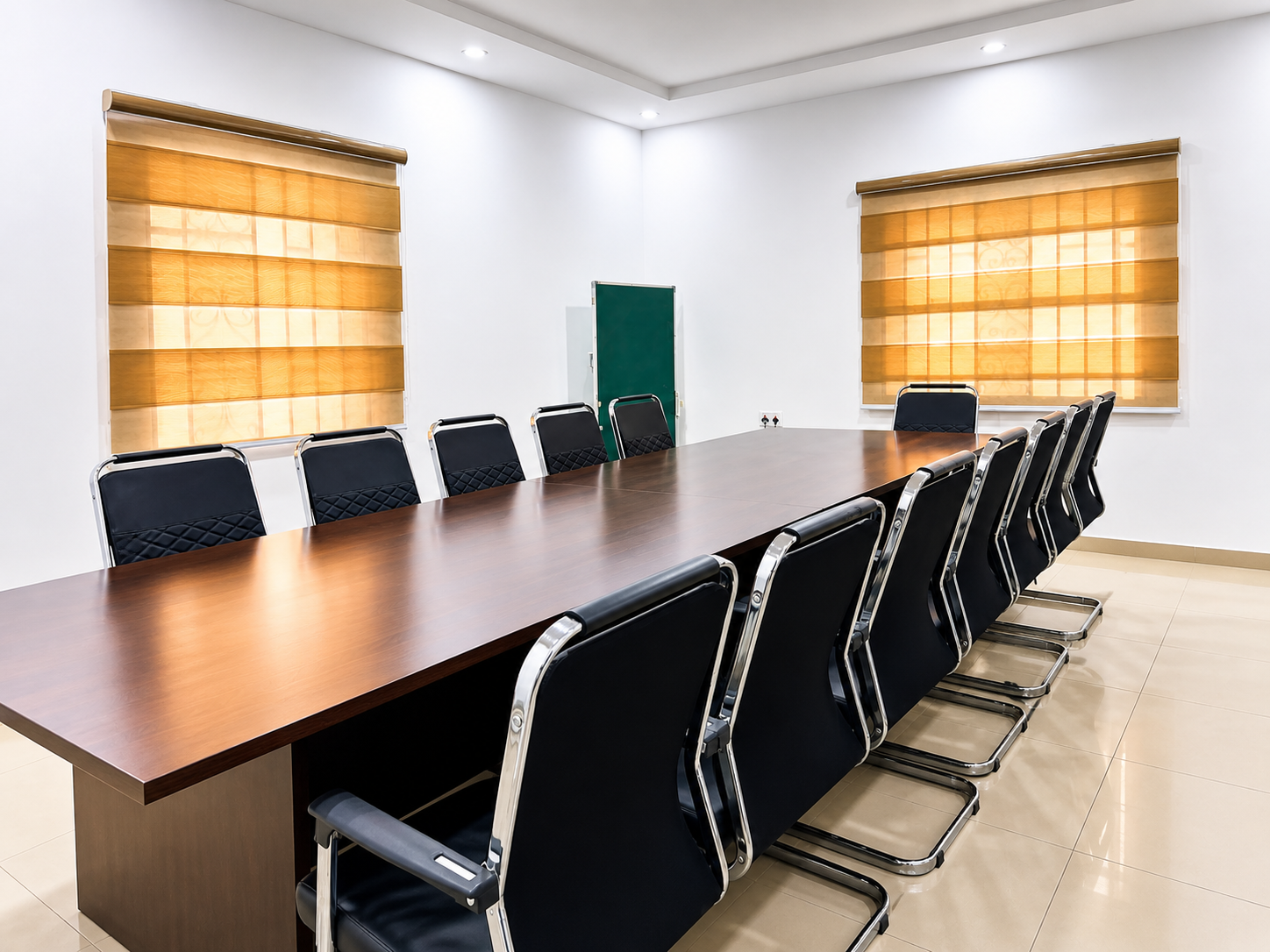 The Global Academy Learning Hub โ classroom with chairs, central table and golden blinds